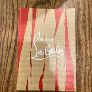 New Christian Louboutin journal book.Little circle mark on the bottom left side